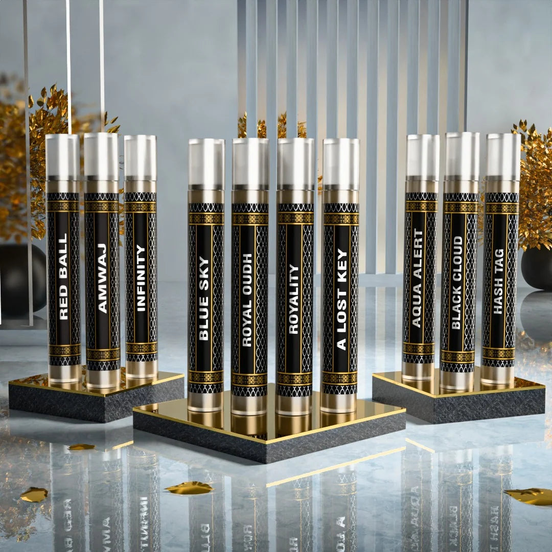 10 sample attar perfume set featuring Red Ball, Amvnaj, Infinity, Blue Sky, Royal Oudh, Royality, Al Lost Key, Aqua Alert, Black Cloud and Hash Tag by Fahaliya’s.
