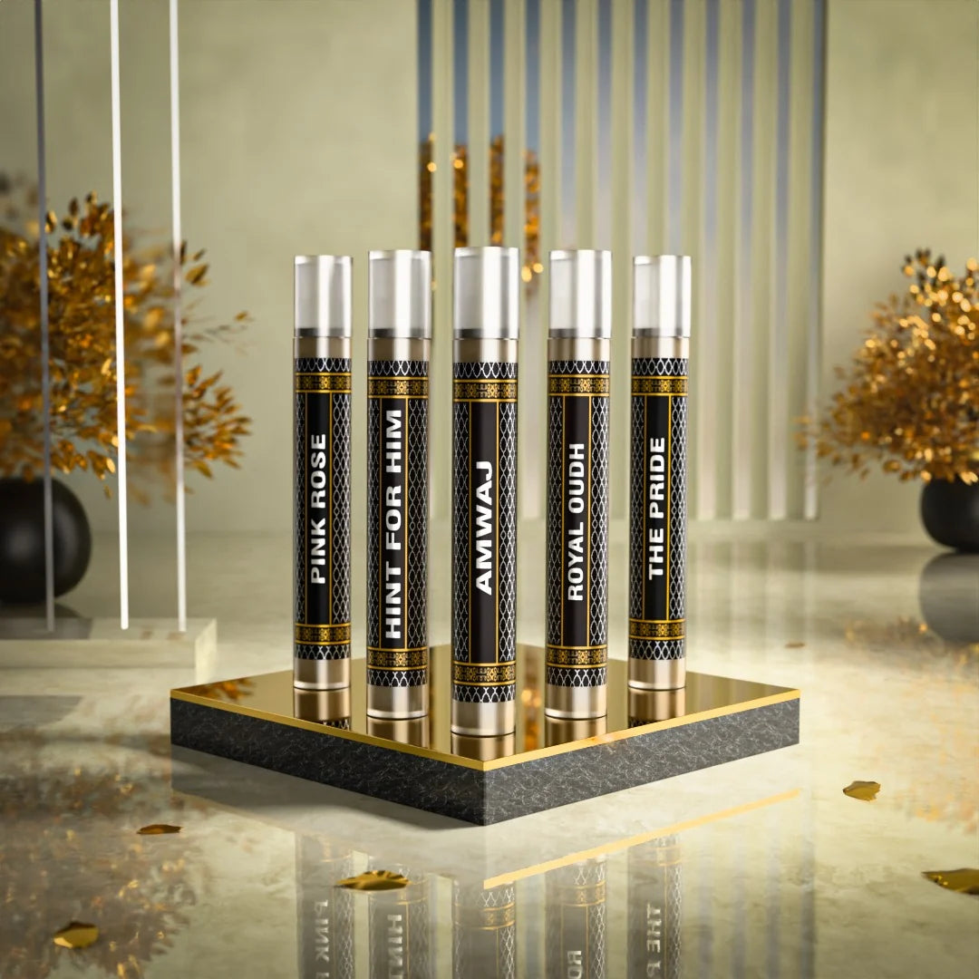 5 premium attar perfume sample set featuring Pink Rose, Hint For Him, Amvnaj, Royal Oudh and The Pride by Fahaliya’s.
